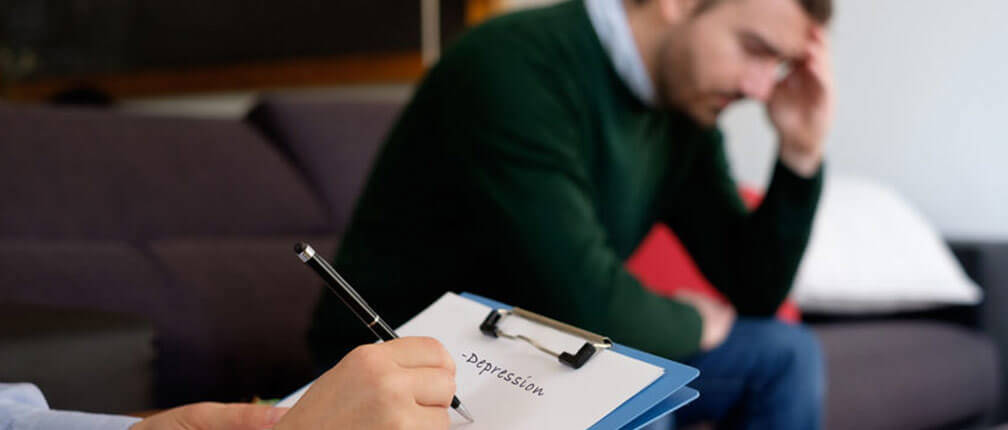 Man depressed at Psychologist